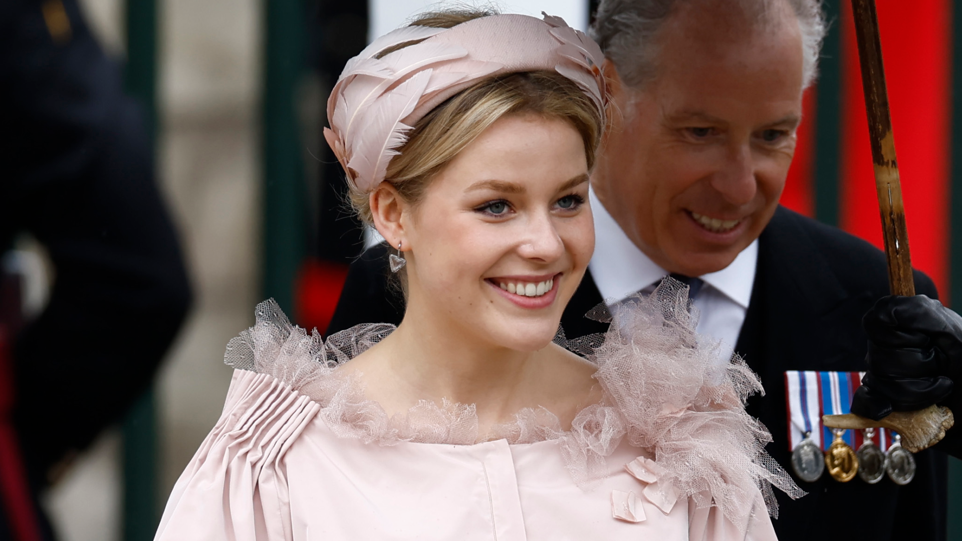 Margarita Armstrong-Jones wearing a pink headband and dress