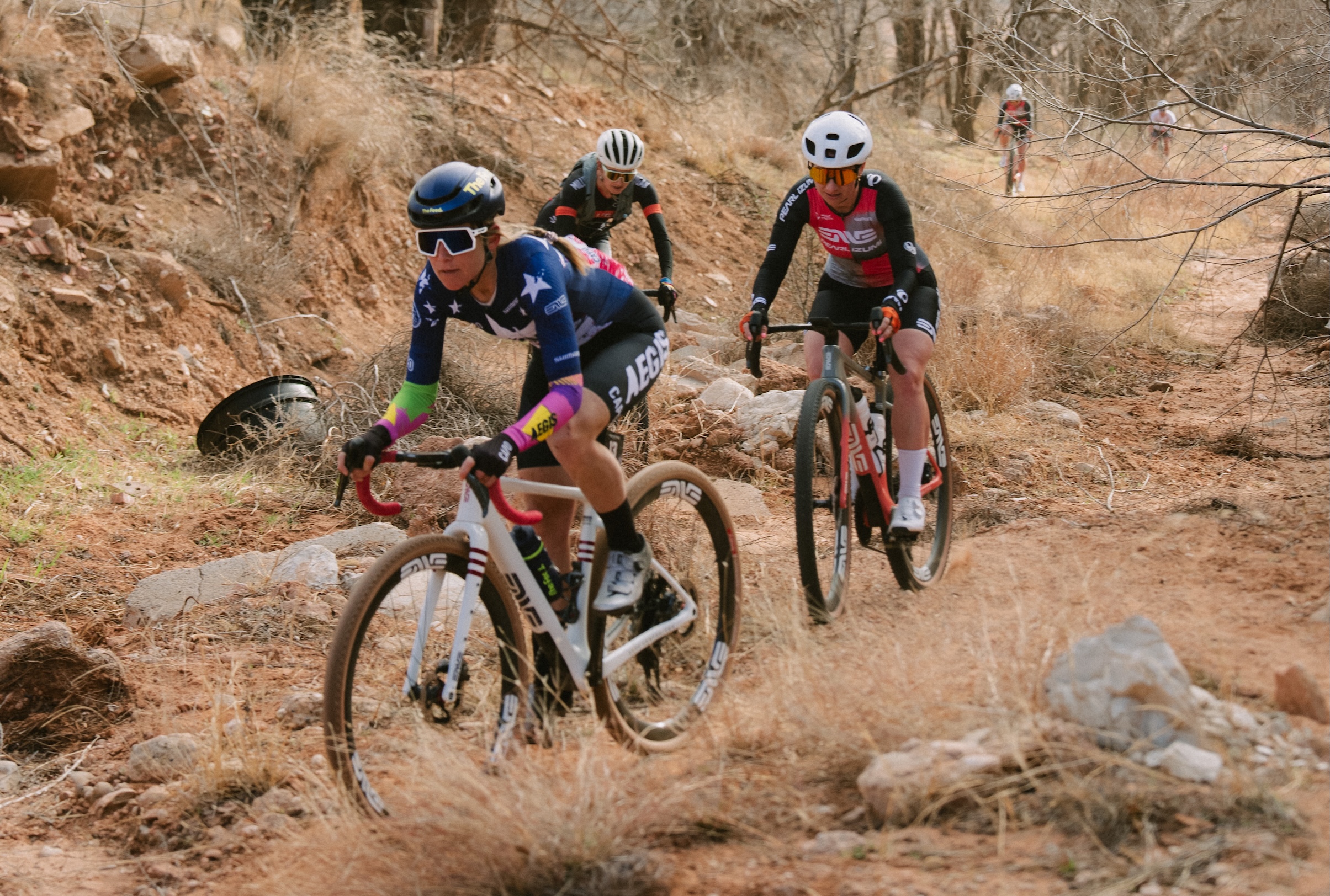 Lauren Stephens leads a chase group in rough area