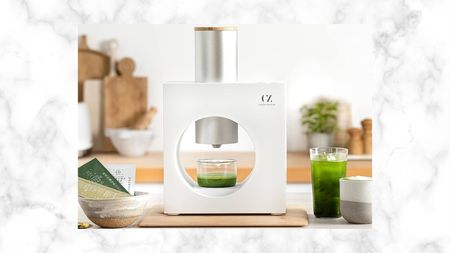 Cuzen matcha maker appliance lifestyle shot on white and grey marble effect background