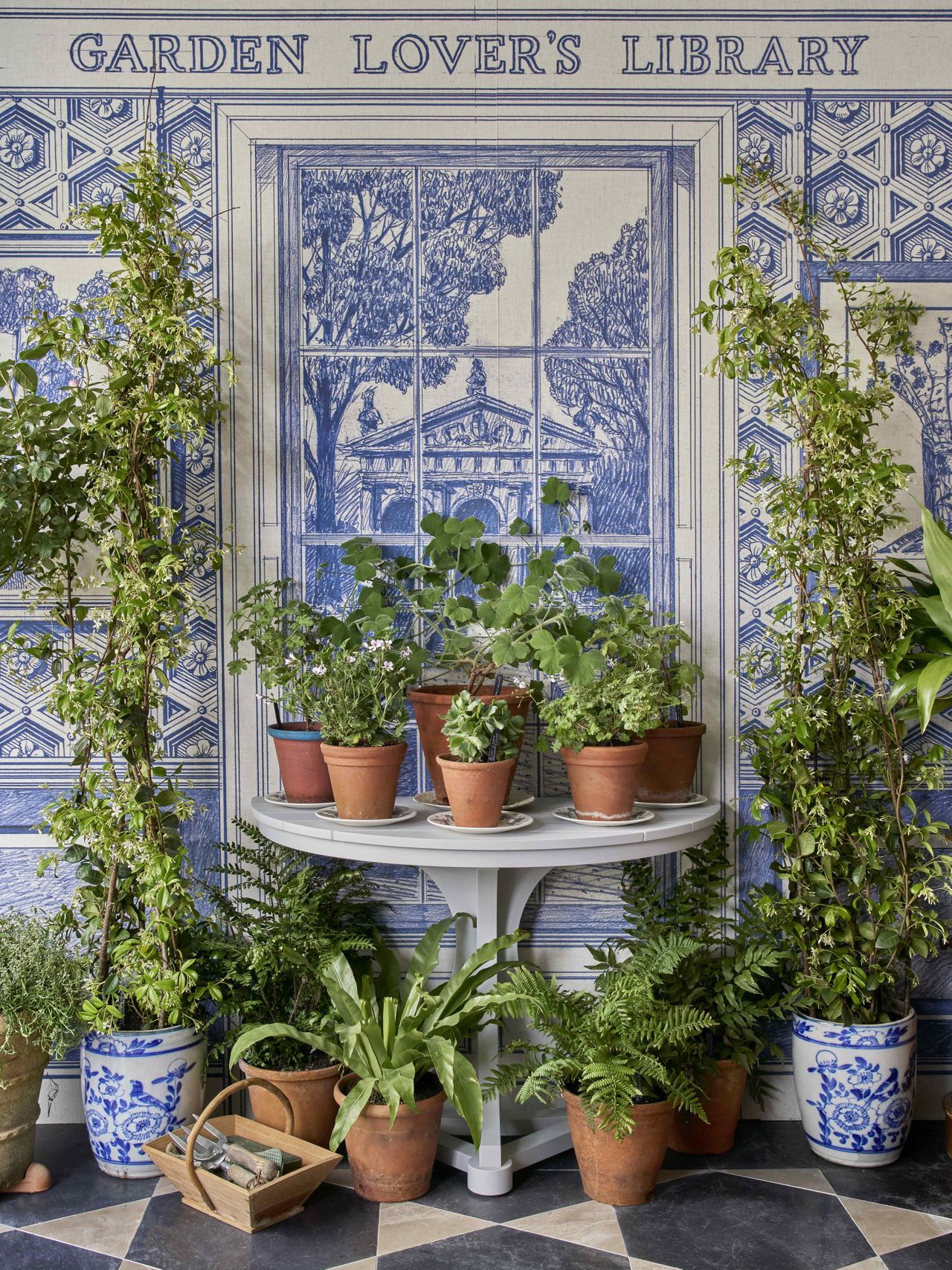 Images of the Garden Lover's Library at RHS Chelsea, showing details of the intricate stonework, books and plants