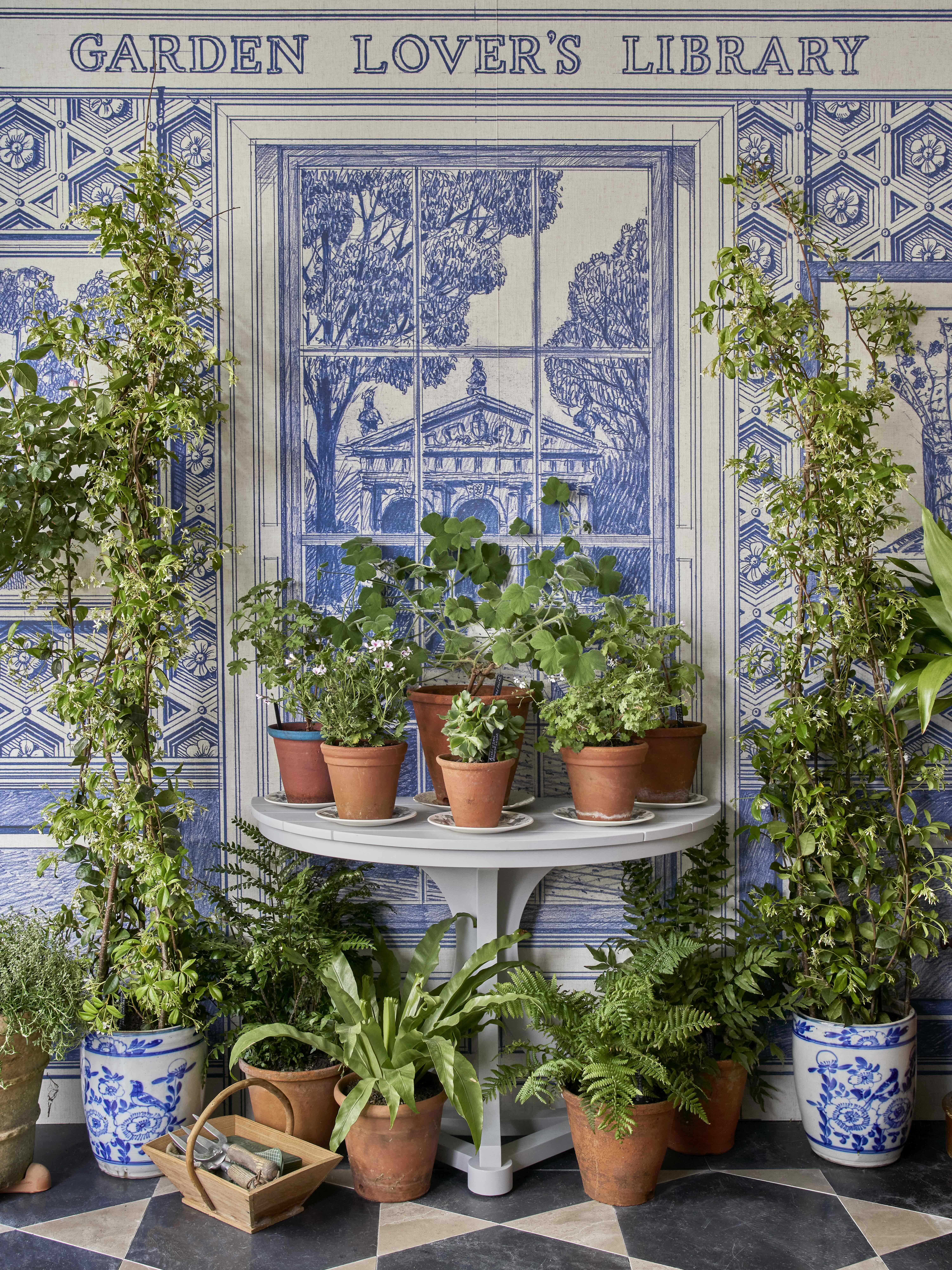 Images of the Garden Lover's Library at RHS Chelsea, showing details of the intricate stonework, books and plants