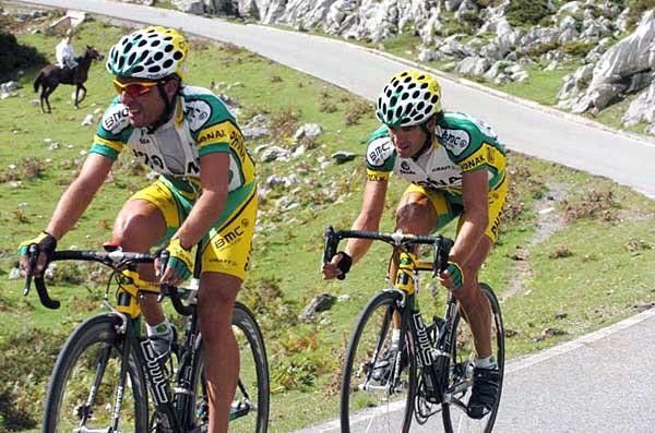 Miguel Perdiguero and Santos Gonzalez (Phonak) work together going over the higher ground