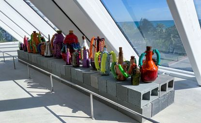 Installation view of Karl Monies vases in Miami exhibition