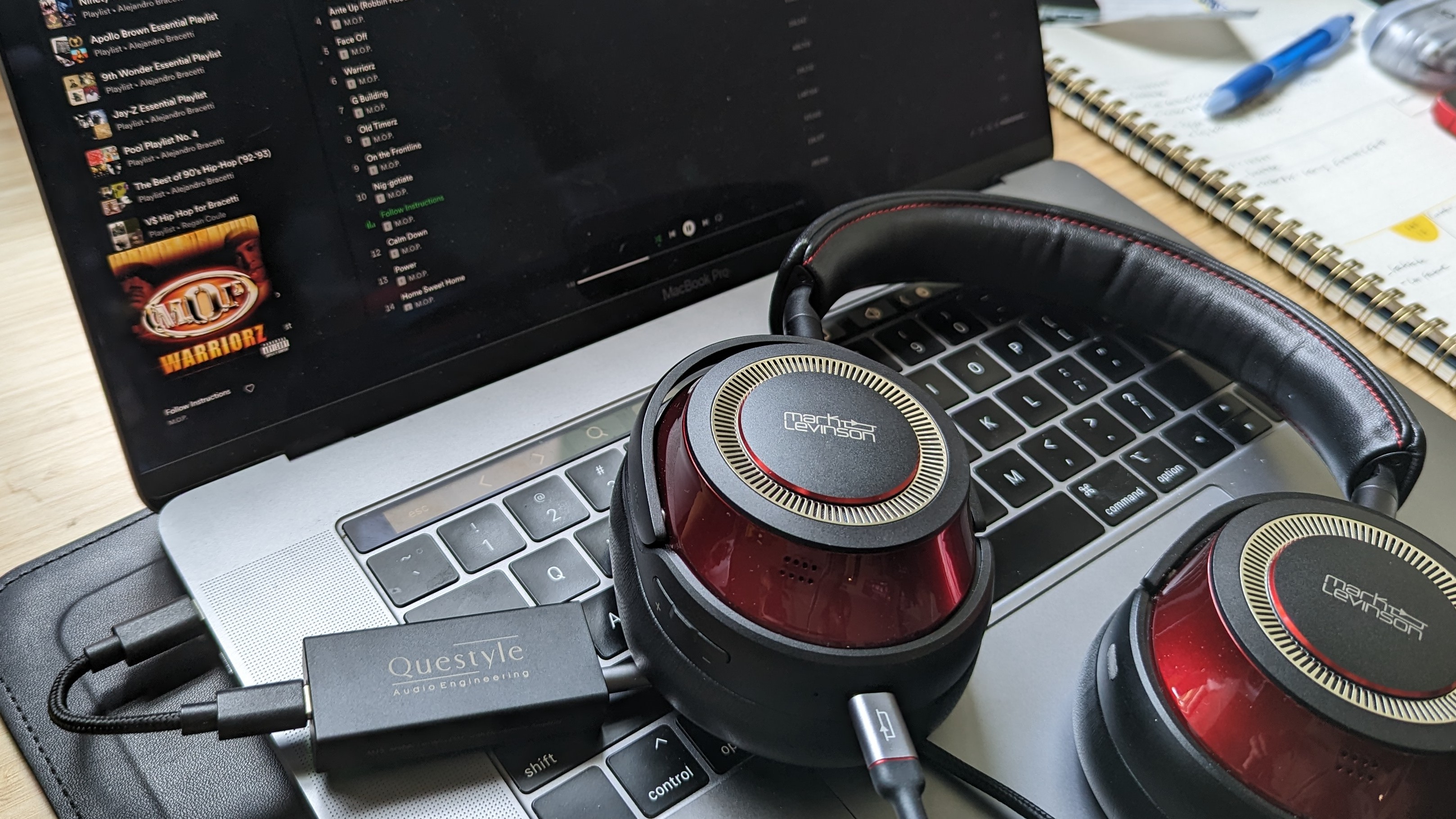 A portable DAC connected to a MacBook Pro