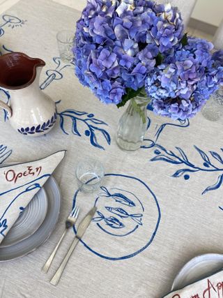 A hand-painted tablecloth