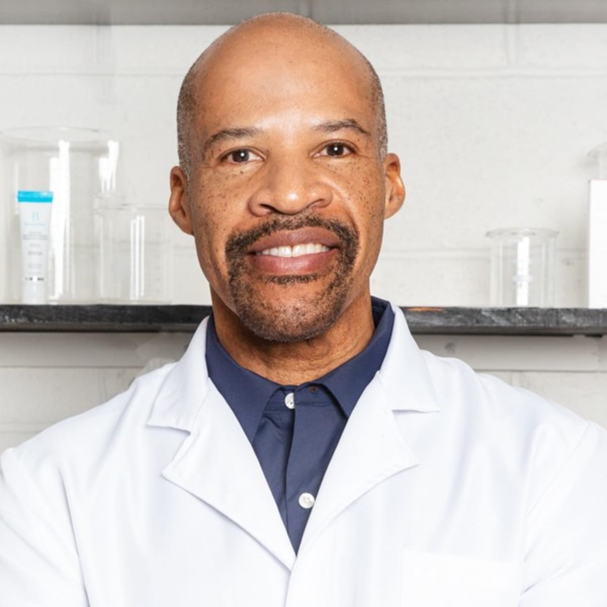 ron robinson in a white lab coat