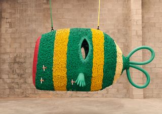 Large sea creature by Porky Hefer made of rope in green and yellow stripes