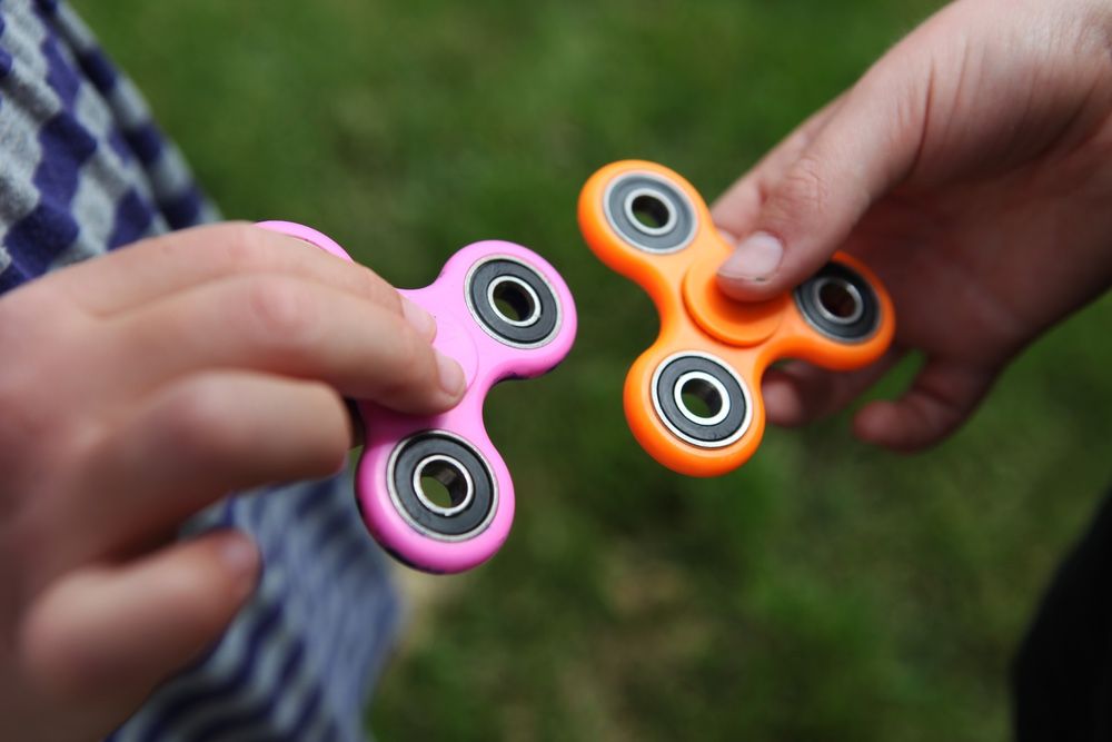 Two fidget spinners.