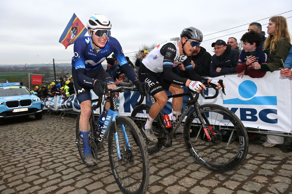 OUDENAARDE BELGIUM APRIL 02 LR Matteo Jorgenson of The United States and Movistar Team and Matteo Trentin of Italy and UAE Team Emirates compete at Paterberg cobblestones sector during the 107th Ronde van Vlaanderen Tour des Flandres 2023 Mens Elite a 2734km one day race from Brugge to Oudenaarde UCIWT on April 02 2023 in Brugge Belgium Photo by Tim de WaeleGetty Images