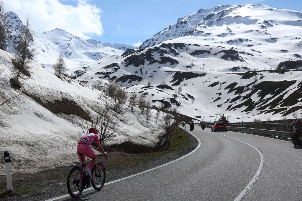 Pink jersey Team UAE's Slovenian rider Tadej Pogacar climbs to win the 15th stage of the 107th Giro d'Italia cycling race, 222km between Manerba del Garda and Mottolino on May 19, 2024. (Photo by Luca Bettini / AFP)