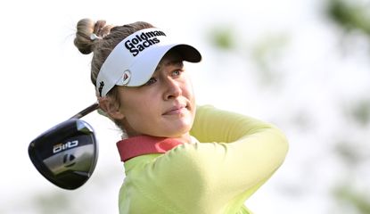 Nelly Korda watches her tee shot after hitting the ball with a driver