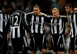 NEWCASTLE, UNITED KINGDOM - JANUARY 31: Newcastle players Kevin Nolan, Damien Duff and Andy Carroll listen to a speech from Sebastien Bassong (l) during the Barclays Premier League match between Newcastle United and Sunderland at St James&#039; Park on February 1, 2009 in Newcastle, England. (Photo by Stu Forster/Getty Images)