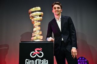 Jai Hindley with the Giro d'Italia trophy at the 2023 route presentation. Hindley was winner of the 2022 Giro d'Italia.
