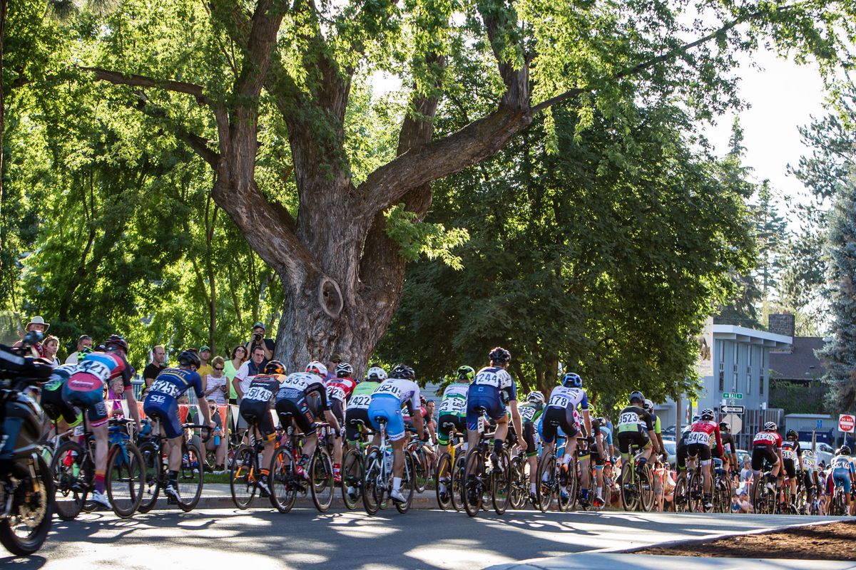 Riders hit the hill at the top of the course.