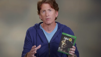 Todd Howard, director and executive producer at Bethesda, holds a copy of Fallout: 76.