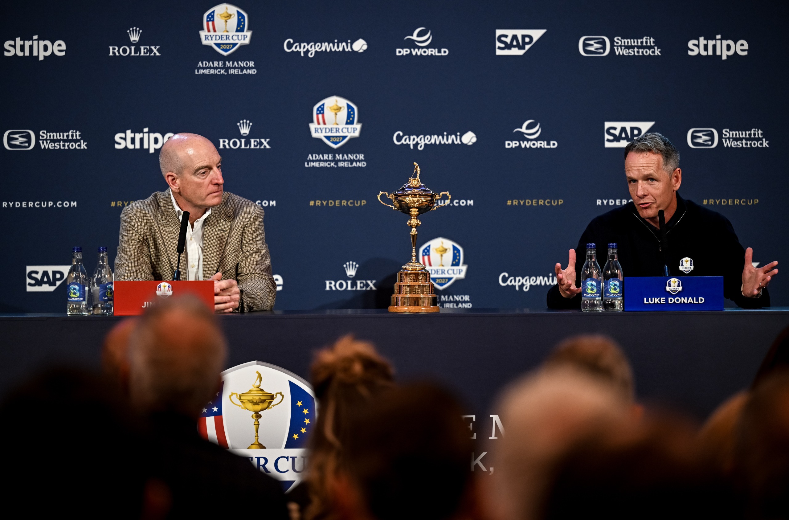 Jim Furyk and Luke Donald sitting at a Ryder Cup Year To Go press conference