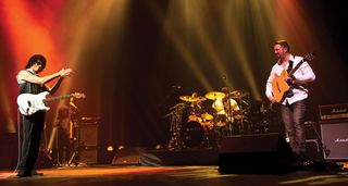 The late Jeff Beck applauds Nicolas Meier as the pair perform together live onstage.