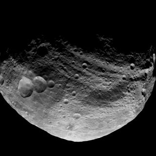 Dawn took this image over Vesta's northern hemisphere after the spacecraft completed its first passage over the dark side of the giant asteroid on July 23, 2011.