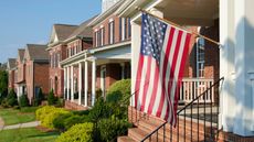 July 4th homeowner association rules: housing association with flag outside 