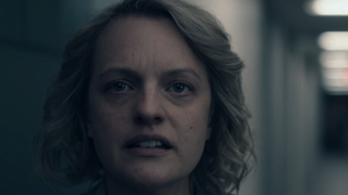 Elisabeth Moss' June learning about the failed rescue mission in The Handmaid's Tale