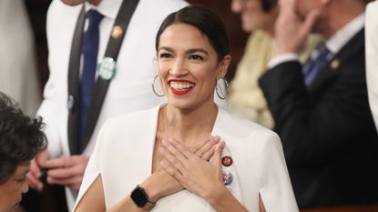 U.S. Rep. Alexandria Ocasio-Cortez (D-NY) greets fellow lawmakers ahead of the State of the Union address in the chamber of the U.S. House of Representatives on February 5, 2019 in Washington, DC. President Trump's second State of the Union address was postponed one week due to the partial government shutdown. 