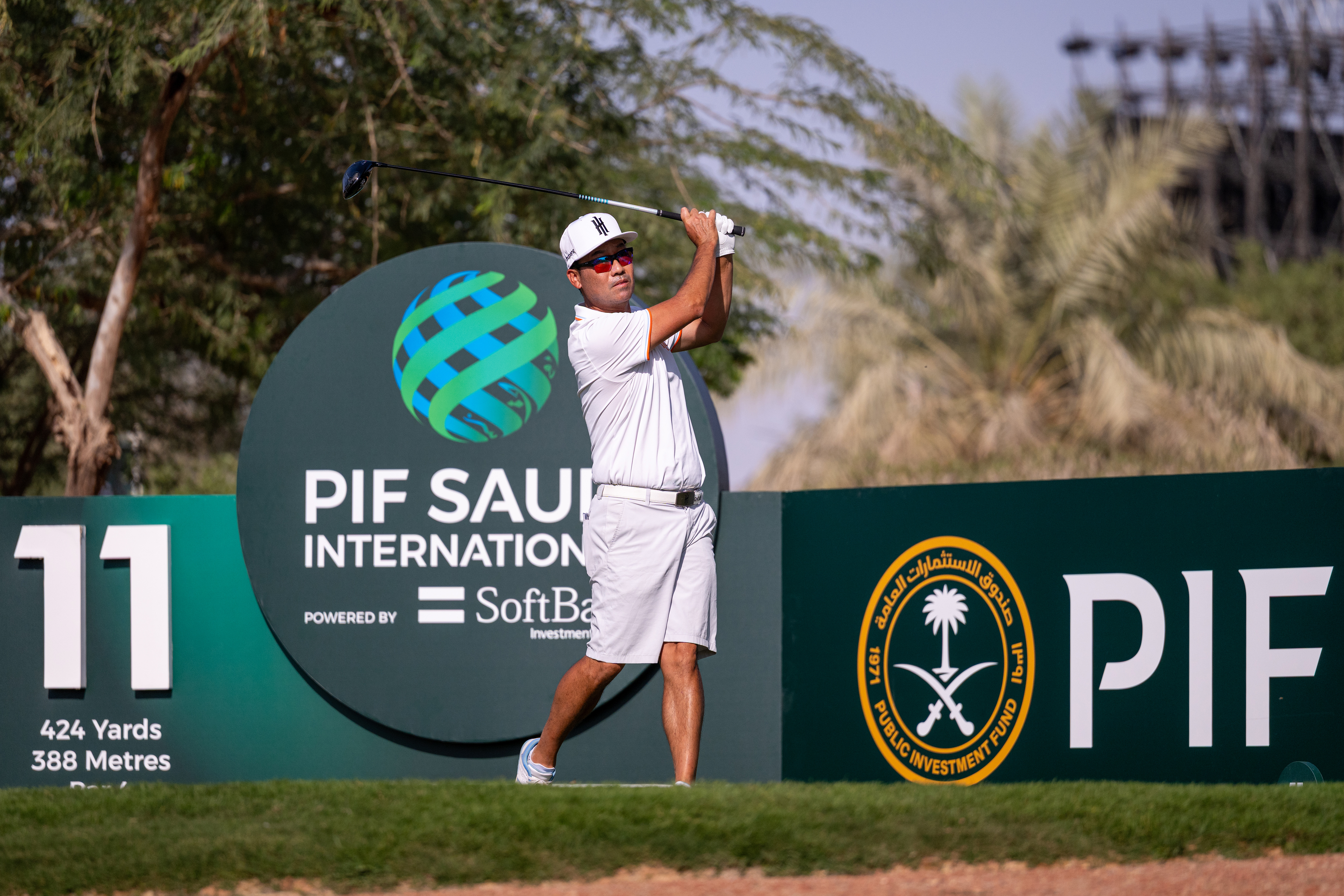 Kevin Na hits a driver