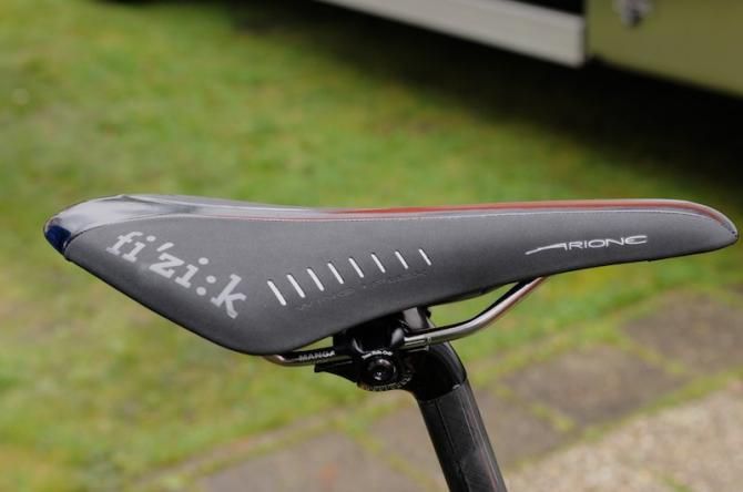 The manganese-railed Fizik Arione is at least black for practicality