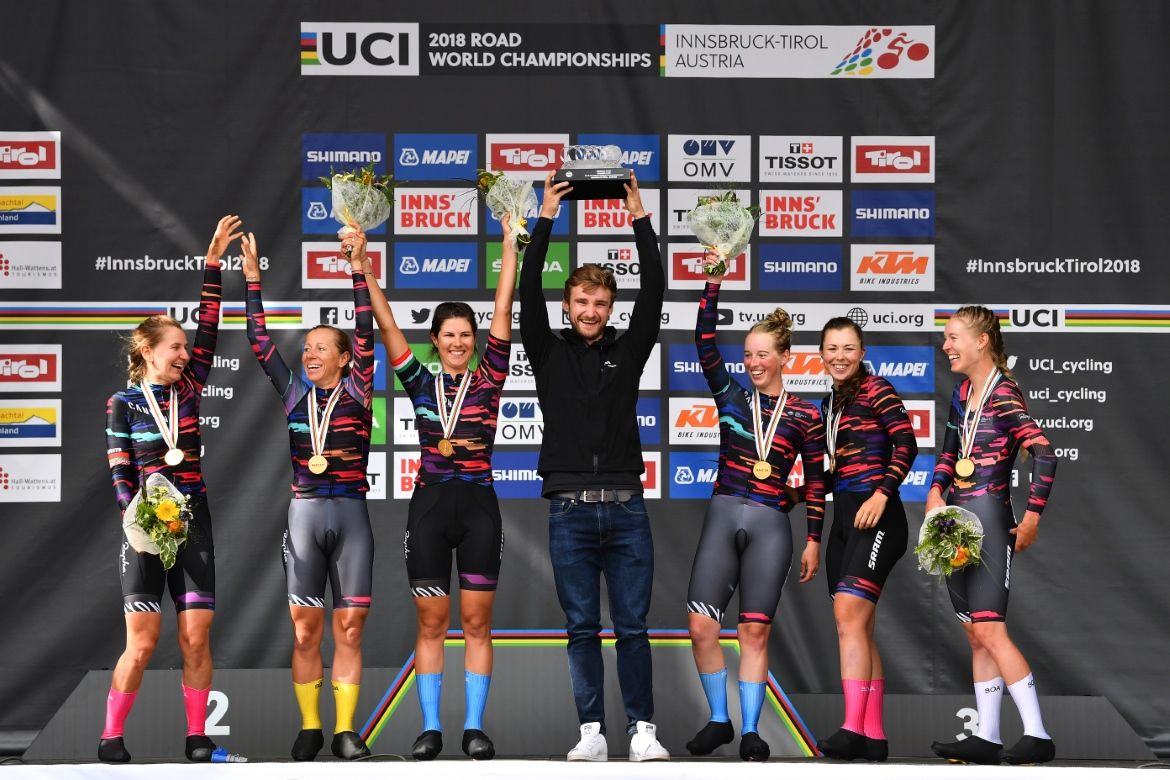 Canyon-SRAM are applauded on the dais.