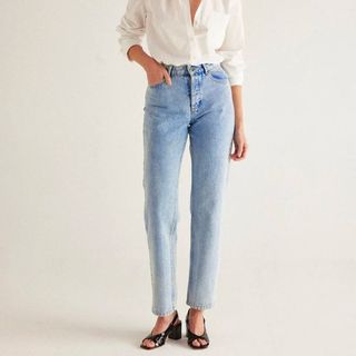 Balzac Paris ice blue jeans on model with shite shirt 