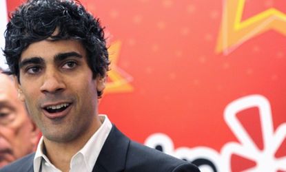 Yelp CEO Jeremy Stoppelman at Yelp's recently opened New York headquarters: The popular business review site is going public but critics say it may never make a profit. 
