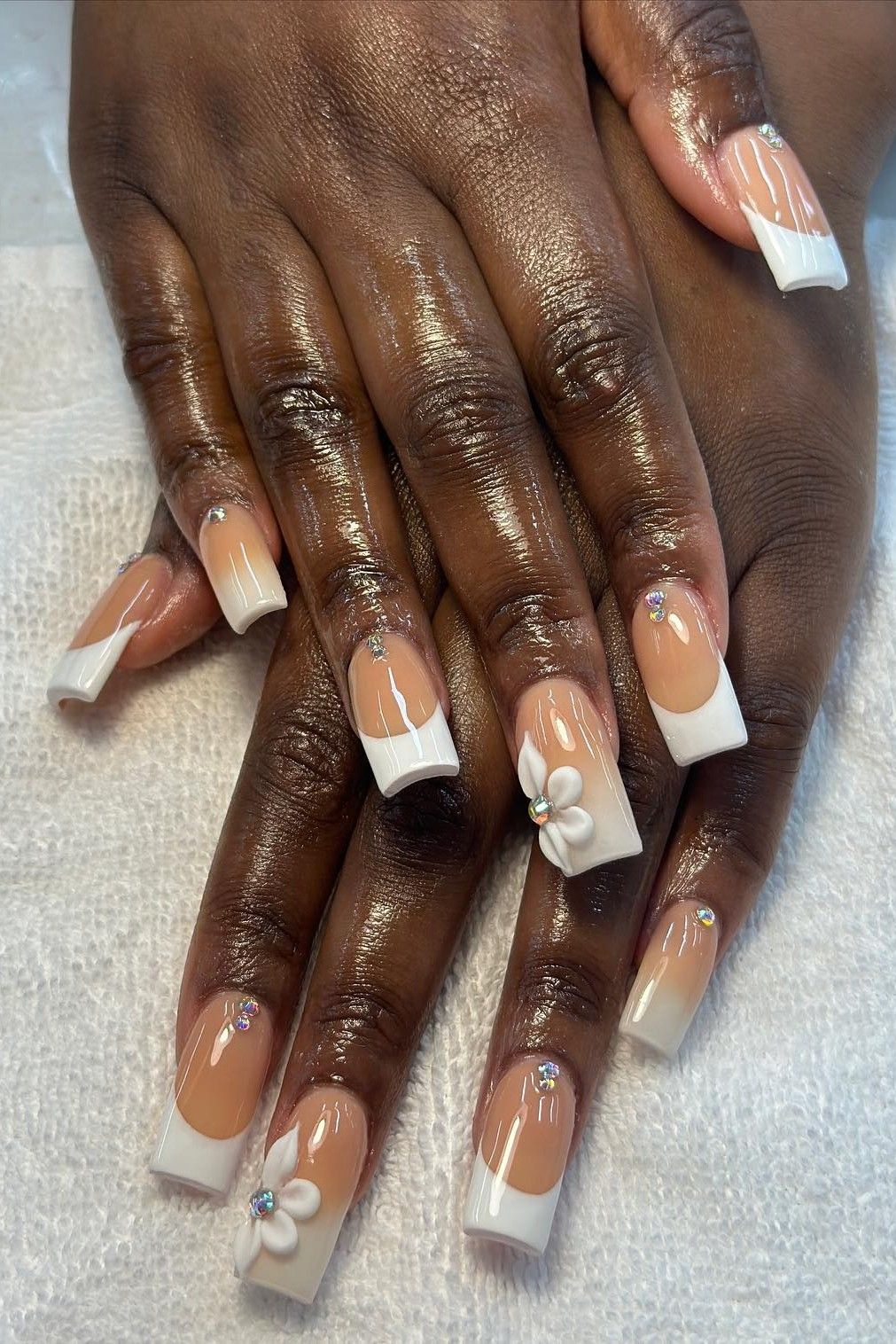 A deep French Y2K manicure.