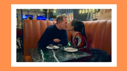 Lynn Ban and Jett Kain kissing at a restaurant