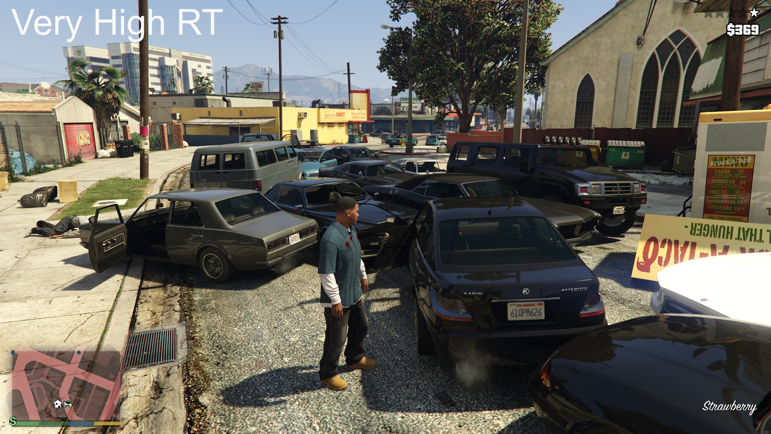 A screenshot taken in GTA 5 Enhanced edition showing a street scene with multiple cars at Very High RT settings