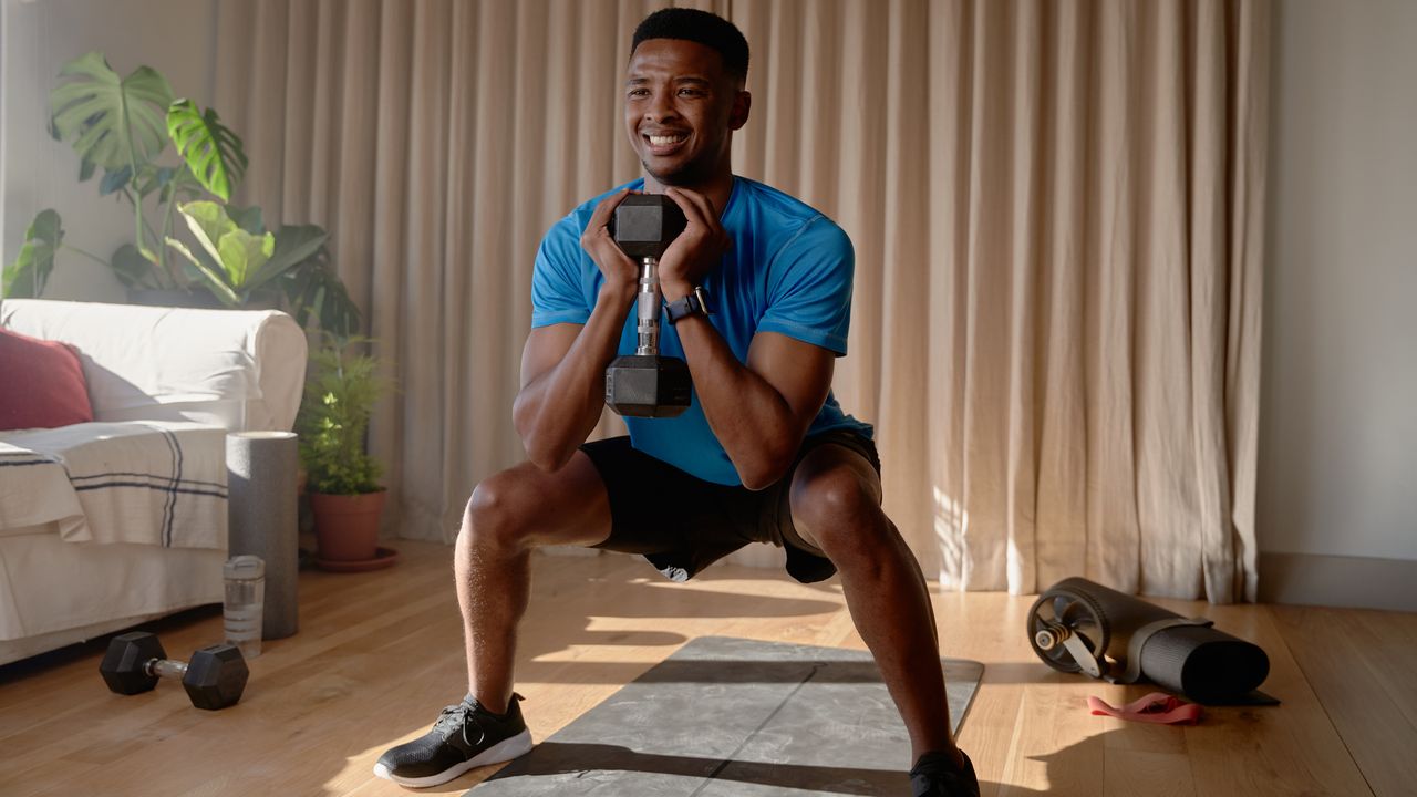 Man holding a goblet squat