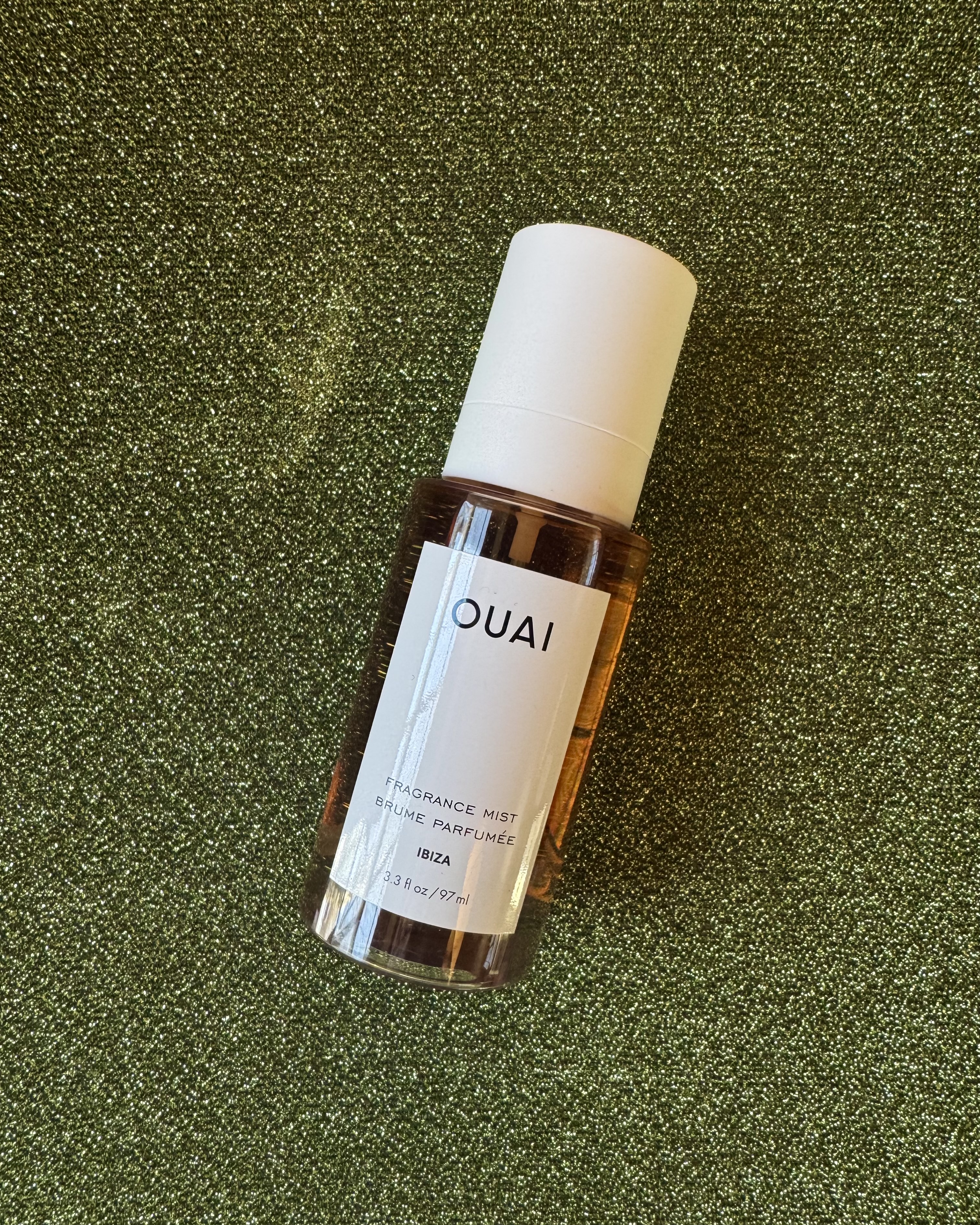 A bottle of Ouai's Ibiza fragrance mist.