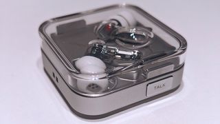 Nothing Ear 3; photos of white and metallic earbuds with transparent plastic casing
