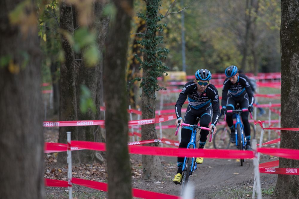 Kerry Warner and Jamey Driscoll roll through the forest section during course inspection
