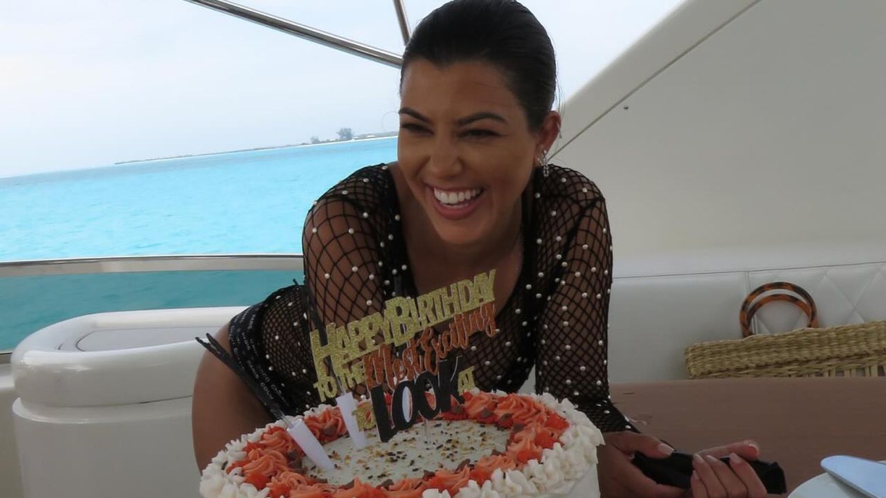 Kourtney Kardashian with birthday cake