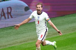 Harry Kane celebrates his first goal of the tournament against Germany
