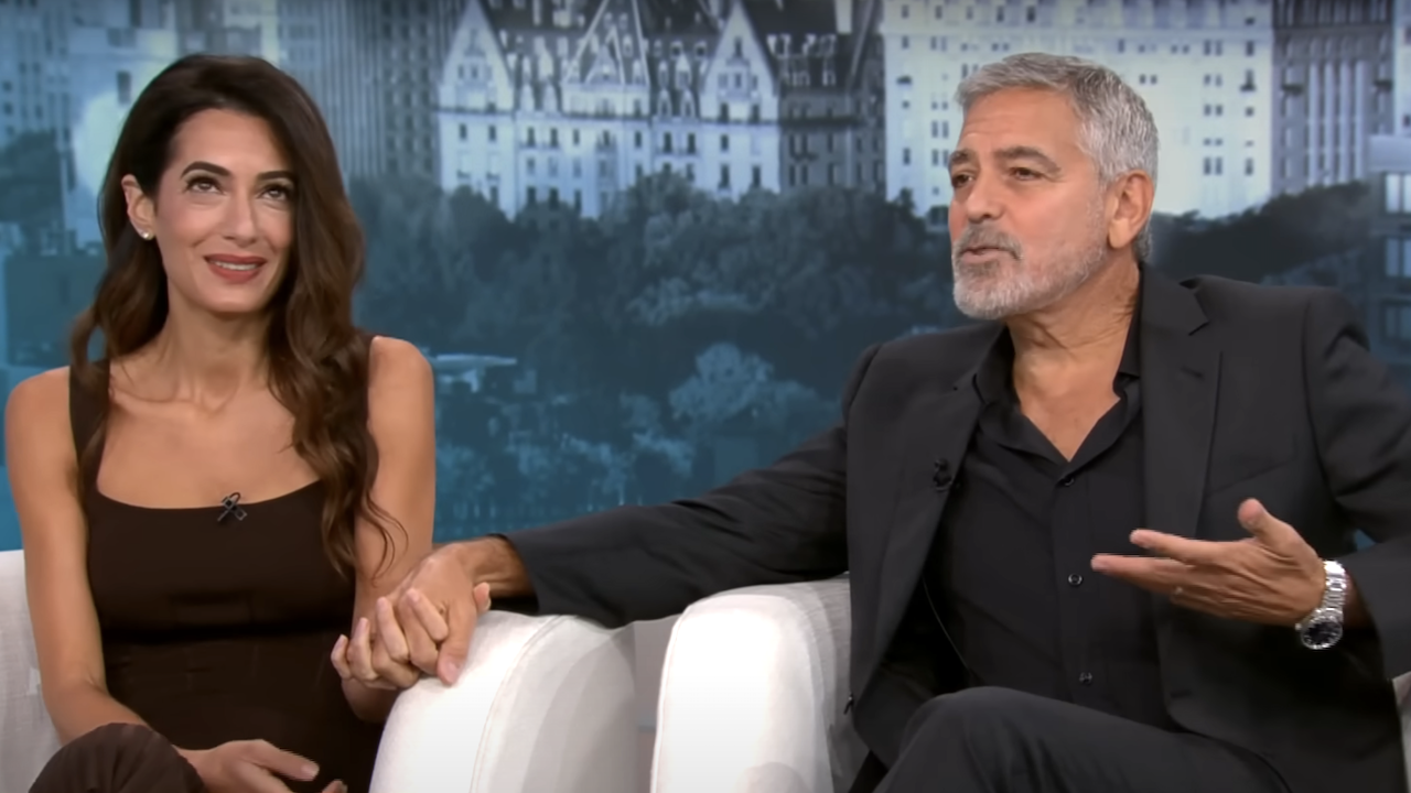 amal and george clooney holding hands during an interview on cbs mornings in 2023