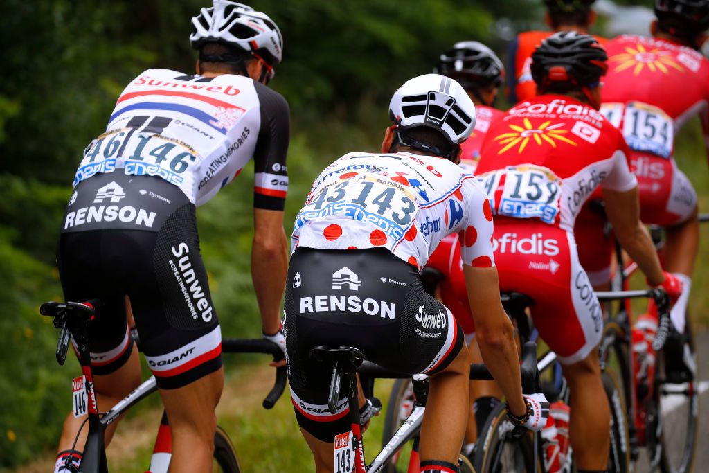 Ramon Sinkeldam and teammate Warren Barguil in the bunch