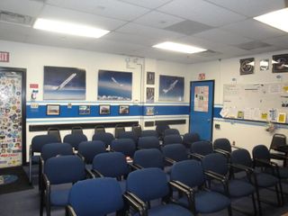 The mission briefing room at NASA's Reduced Gravity Education Flight Program at Ellington Field, Houston, awaits crews for the agency's Microgravity University flights in July 2013.