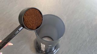 filling the aeropress xl chamber with coffee grounds