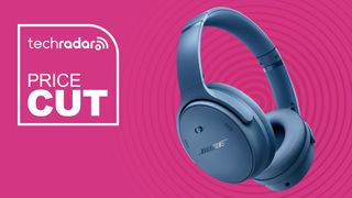Bose QuietComfort Headphones in Blue Dusk on pink background with TechRadar price cut sign