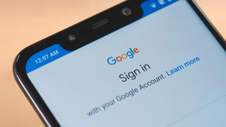 A close-up of the sign in to google account window on a phone