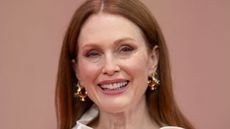 julianne moore on a pink background