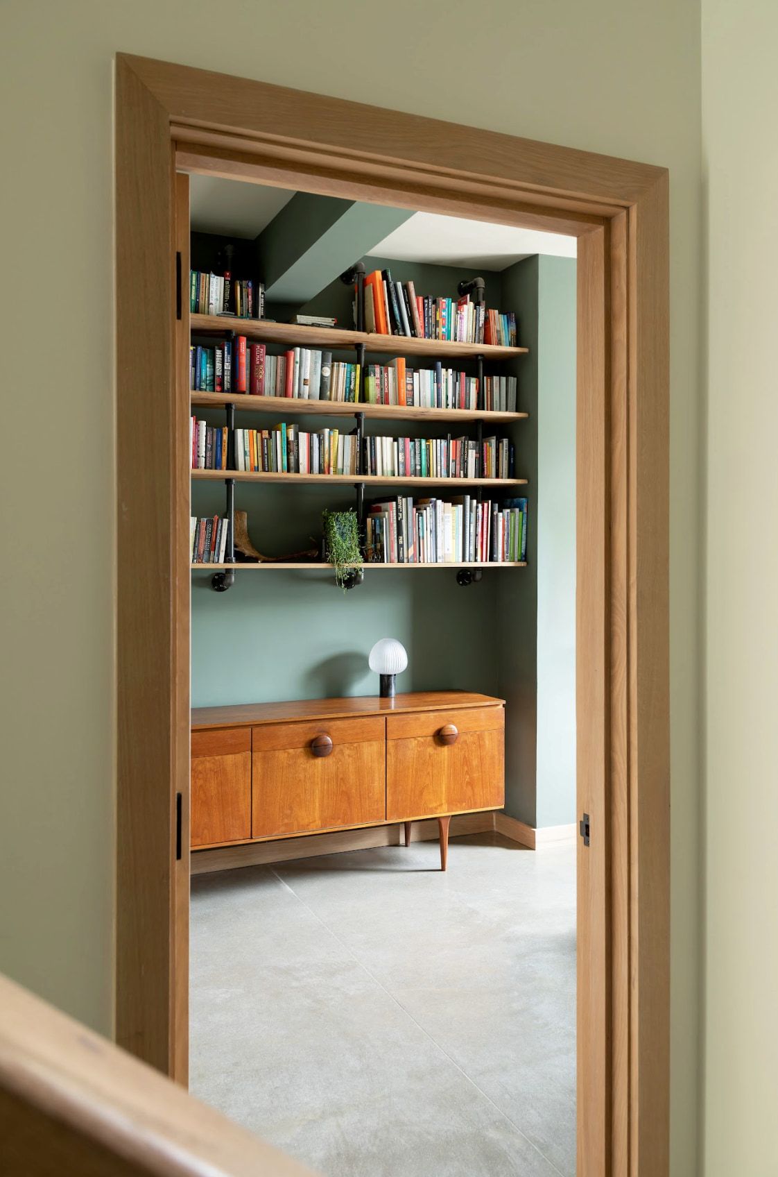 A home office with a bookcase