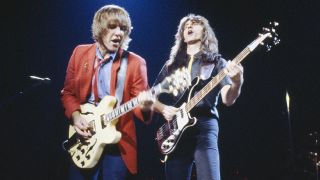 Alex Lifeson, Geddy Lee of Canadian progressive rock trio, Rush, performing on stage, United States, 18th May 1981. (Photo by David Tan/Shinko Music/Getty Images)