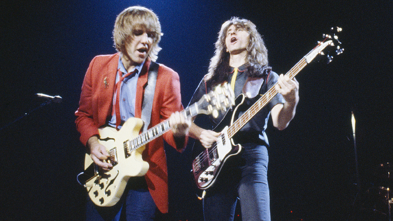 Alex Lifeson, Geddy Lee of Canadian progressive rock trio, Rush, performing on stage, United States, 18th May 1981. (Photo by David Tan/Shinko Music/Getty Images)