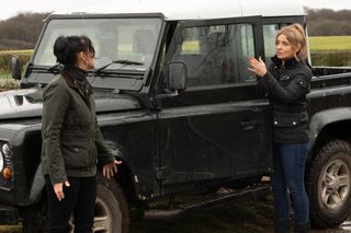 Emmerdale Moira and Charity argue by a car on a country road. 